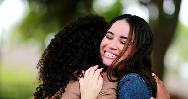 Two Diverse Girls Hugging Young Women Embrace Outdoors — Stock Photo, Image