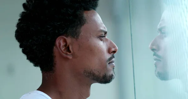 Pensive African Man Looking Out Window Indoors Thoughtful Black Person — 图库照片