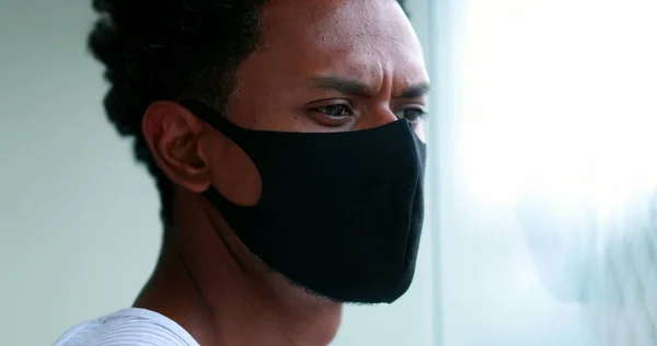 Black African Man Standing Window Looking Outdoors Wearing Epidemic Mask — Fotografia de Stock