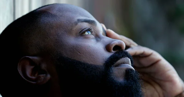 Contemplative black African man. Person meditating thoughts