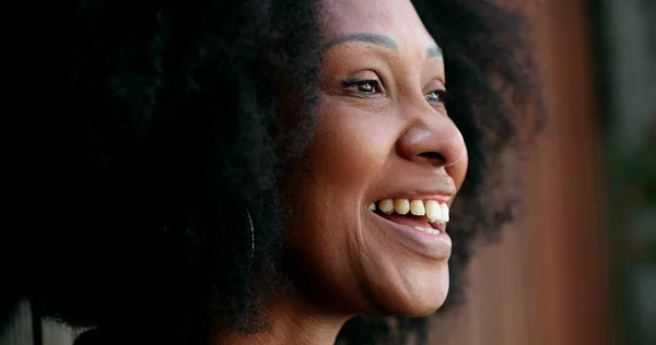 Happy black African woman portrait smile outside joyful person