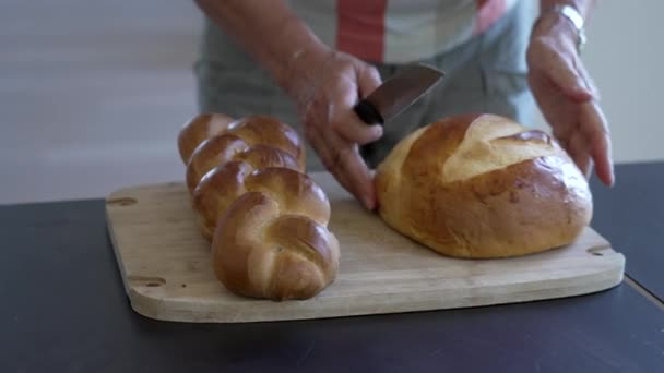 Hands Cutting Braided Swiss Brioche Bread Close Person Slices Homemade — Stock Video
