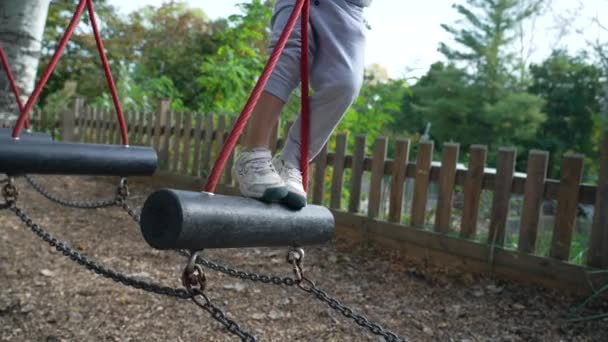 Playful Little Boy Keeping Balance Playground Structure Child Playing Park — Vídeo de stock