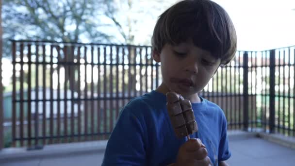 Child Eating Chocolate Ice Cream Portrait Kid Eats Sweet Dessert — 비디오