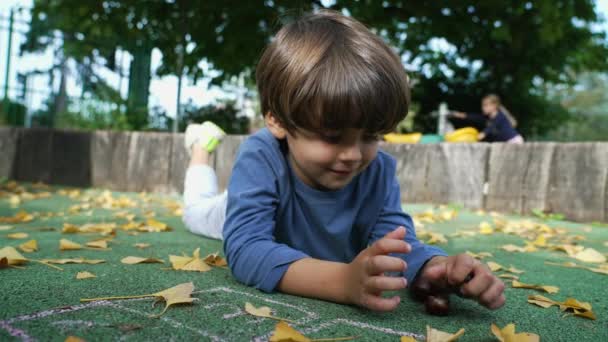 Portrait Happy Child Park Smiling One Small Boy Laying Ground — Vídeo de Stock