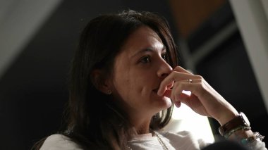 Casual woman in conversation talking among friends explaining concerns