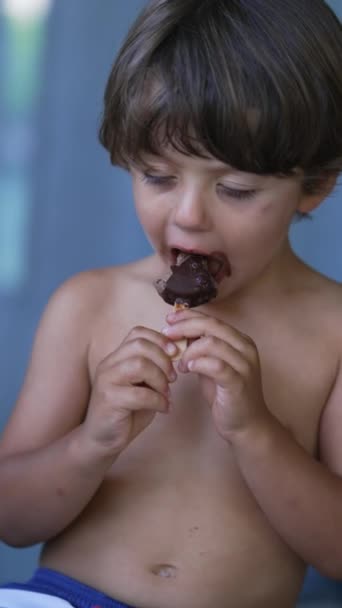Pensive Child Taking Bite Chocolate Icecream One Small Boy Eats — Vídeo de Stock