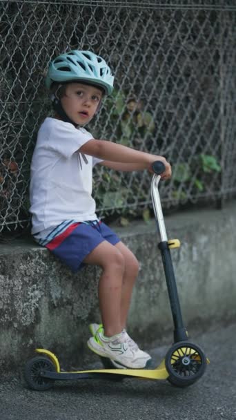 One Adorable Little Boy Wearing Protective Helmet Holding Scooter Sitting — Video Stock