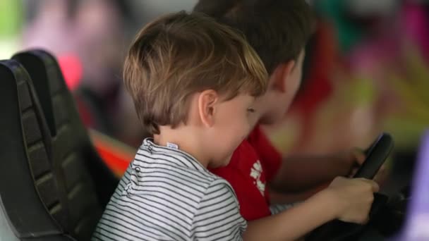 Children Having Fun Bumper Car Fun Fair Little Boy Driving — Vídeo de Stock