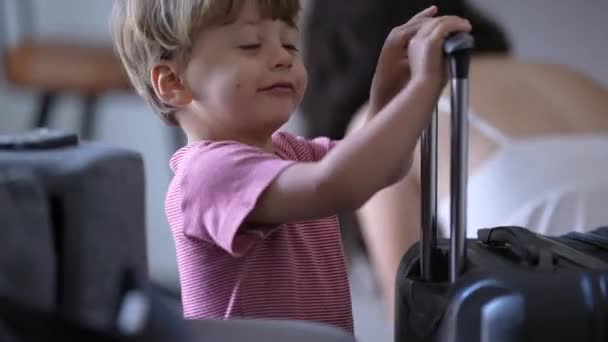 Child Playing Luggage Handle One Little Boy Preparing Travel Suitcase — Stockvideo