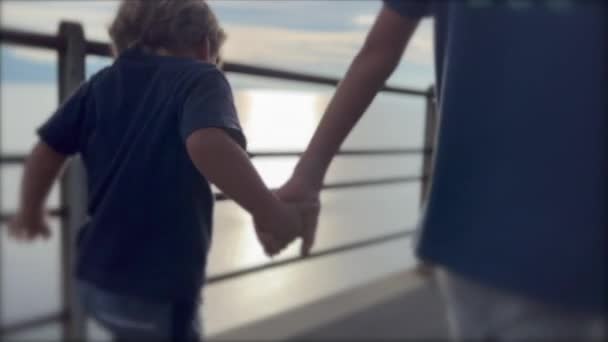 Teen Brother Holding Hand Younger Sibling Protective Family Concept Two — Video