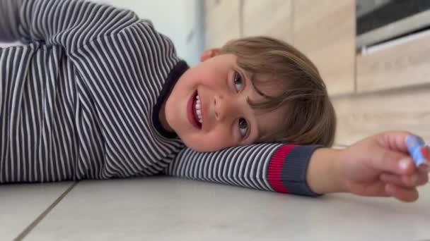 Happy Child Laying Floor Smiling Closeup Kid Boy Childhood Lifestyle — Video