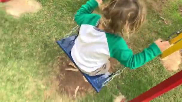 Parent Pov Pushing Child Playground Swing — Vídeo de stock