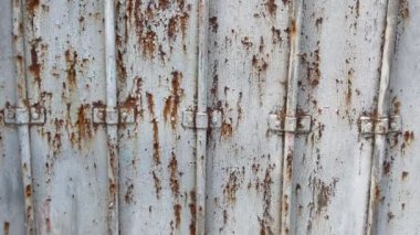 rusty old metallic door closeup. aged rustic metal