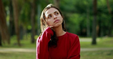 Woman having an idea epiphany. Latina hispanic girl having an insight for solution