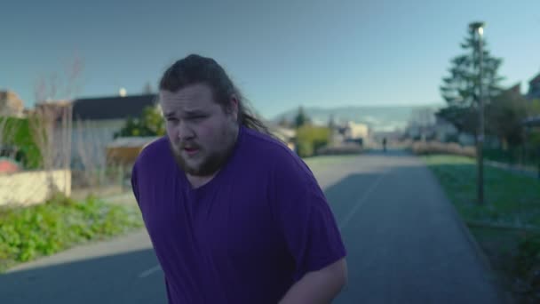 One Overweight Young Man Getting Back Shape Exercising Outdoors Running — Video Stock