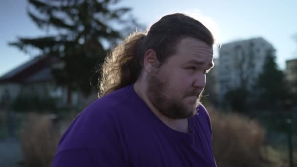 One Overweight Young Man Getting Back Shape Exercising Outdoors Running — Stock video