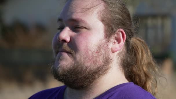 One Meditative Overweight Young Man Standing Outdoors Close Face Thinking — Video