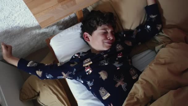 One Young Boy Stretching Body Waking Morning Preteen Child Laying — Αρχείο Βίντεο