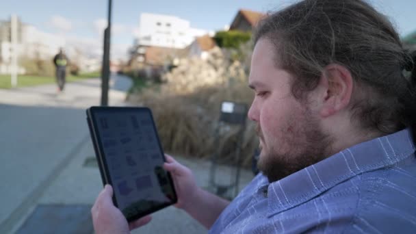Person Holding Tablet Outdoors Browsing Online Store Selecting Product Young — Video Stock