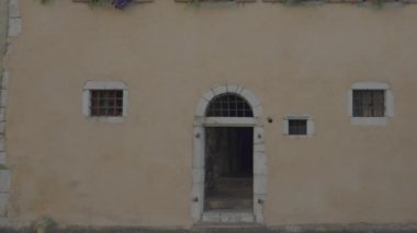 European building facade architecture with many antique windows. Traditional buildings in France