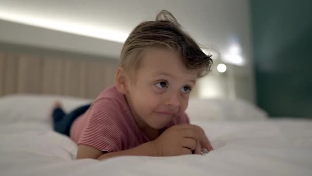 Close Small Boy Laying Bed Watching Cartoon Camera Small Boy — Vídeo de Stock