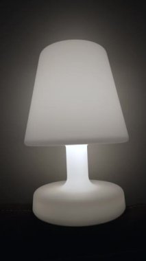 One Lamp glowing light in dark. Bedside nightlamp in Vertical Video