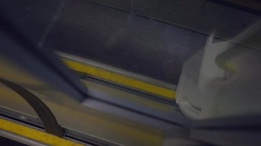 Train leaving station in high speed. Perspective of floor in underground subway station platform transportation