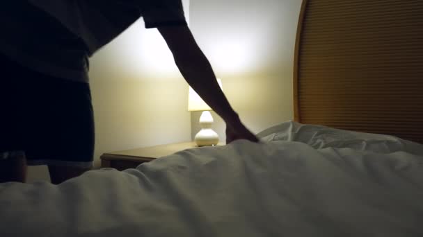 Person Going Bed Sleep Man Lays Turns Light Bedside — Stockvideo