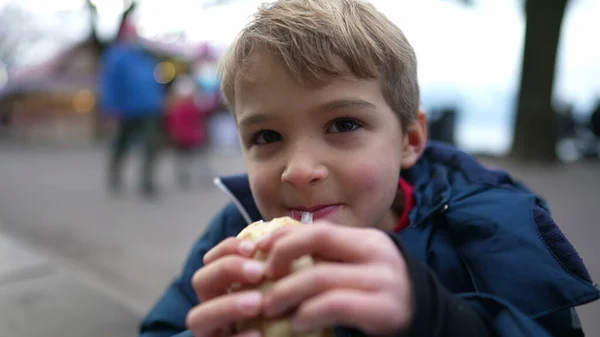 Small Boy Eating Pancake City Street Winter Season Hungry Child — Fotografia de Stock