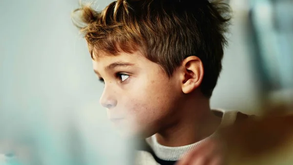 Candid Thoughtful Young Boy Closeup Face One Pensive Child Thinking — Zdjęcie stockowe