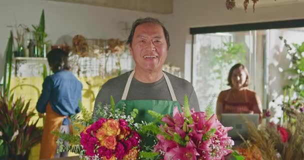 One Happy Mature Japanese Small Business Owner Flower Shop Holding — Video