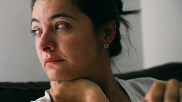 stock image One depressed woman feeling anxiety. Portrait of a pensive sad person closeup face suffering alone