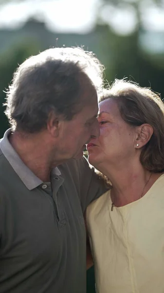 Senior Couple Kissing Sunlight Romantic Moment Mature Older Married Husband — Stock Photo, Image