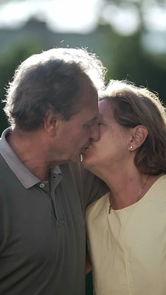Senior Couple Kissing Sunlight Romantic Moment Mature Older Married Husband — Stock Photo, Image