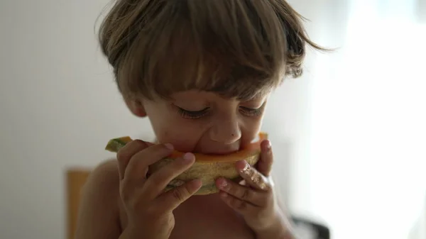 Portrait Small Boy Eating Yellow Melon Fruit Child Eats Fruit — Stock Photo, Image