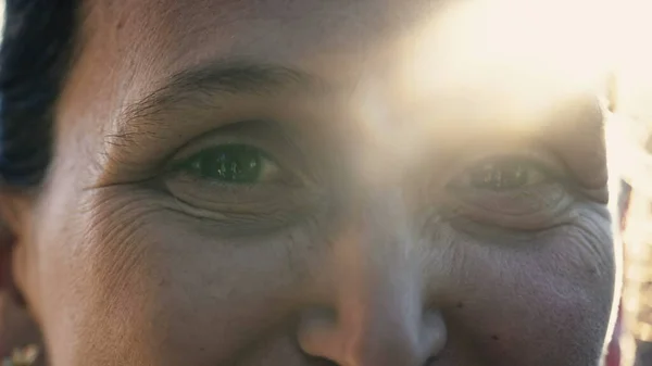 Extreme Close Woman Her 40S Eyes Turning Head Camera Sunlight — Stok Foto