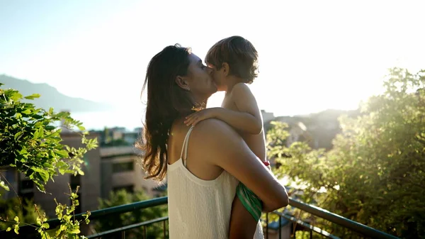 Affectionate Mother Holding Child Arms Standing Outdoors Scenic View Sunset — Stock Photo, Image