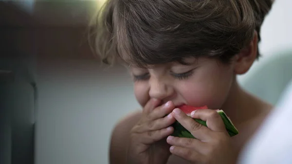 Candid Child Taking Bite Red Watermelon Fruit One Small Boy — Stockfoto