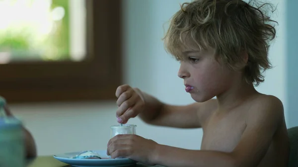 One Young Boy Eating Yogurt Candid Kid Eats Nutritious Breakfast — Photo