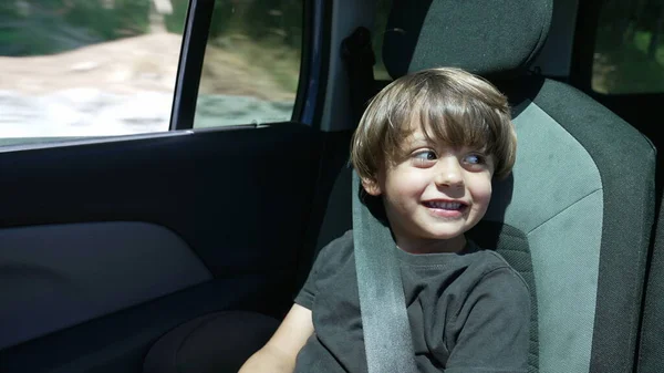 One Happy Small Boy Traveling Road Seated Backseat Car Child — Stock Fotó