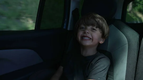 One Happy Small Boy Traveling Road Seated Backseat Car Child — Foto Stock