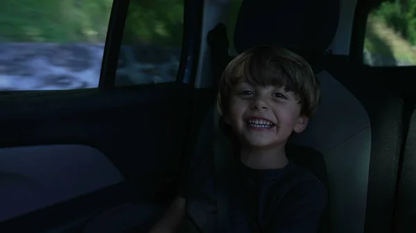 One Happy Small Boy Traveling Road Seated Backseat Car Child — Zdjęcie stockowe
