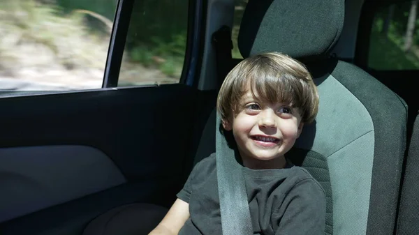 One Happy Small Boy Traveling Road Seated Backseat Car Child — Stock Photo, Image