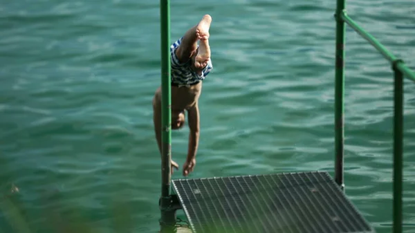 Young Boy Running Diving Water Teen Child Plunges Lake Dock — Stock Photo, Image