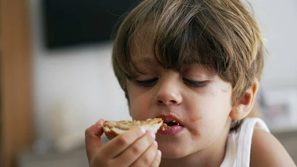 Portrait Young Boy Snacking Peanut Butter Bread Closeup Child Face — Foto Stock