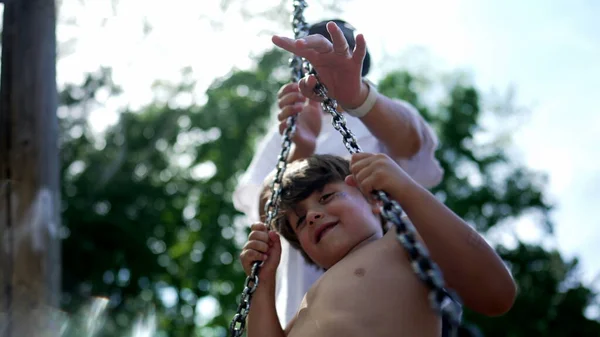 Child Playground Swing Mom Turning Twisting Child Little Boy Enjoying — Fotografia de Stock