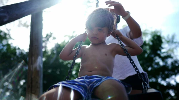 Happy Young Boy Turning Playground Swing Enjoying Summer Holiday Vacations — Stockfoto