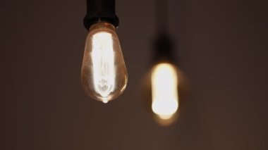 Turning light ON. Ceiling bulb electricity switching ON. Idea eureka concept