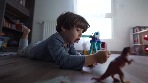 Joyful Child Playing Toys Bedroom Little Boy Laying Floor Having — Video Stock